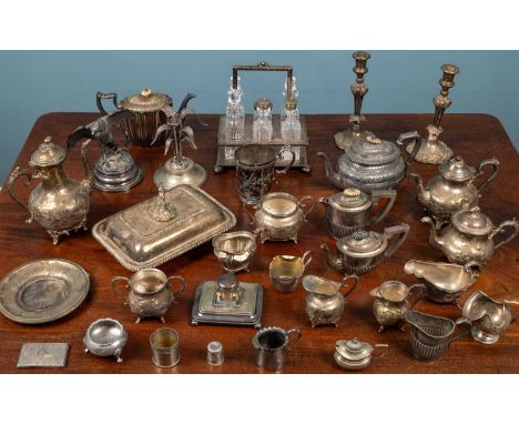 A collection of silver plated wares to include a pair of candlesticks; a tea service; four further teapots; a tankard; a toba