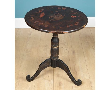 An ebonised occasional table with a chinoiserie decorated circular top, raised on tripod outscrolled legs72.5cm high x 57.5cm