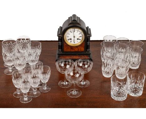 A Victorian mantel clock with an ebonised case and French movement; together with a collection of Waterford cut glasswareQty: