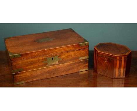 A mahogany and brass bound writing slope with green leather inset, the top with a brass plaque matching the brass escutcheon;