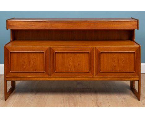A McIntosh teak 'Forfar' two-tier sideboard, the upper section with drawers over the lower section with central hinged compar