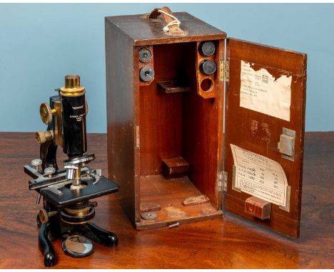 A W Watson &amp; Sons service 77957 monocular microscope with four objectives and an adjustable slide clamp by J Swift &amp; 
