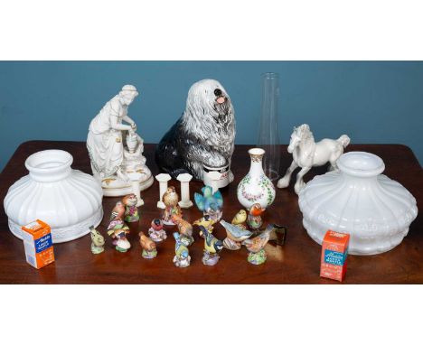 A collection of various miscellaneous ornaments to include a Beswick Dulux advertising dog; a group of Royal Worcester porcel