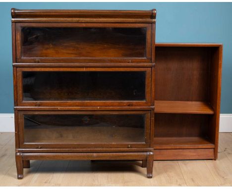 A Globe Wernicke stacking bookcase with glazed retractable doors, comprised of three sections, bottom section with Globe Wern