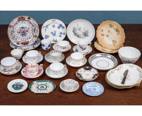 A collection of 18th century and later porcelain to include a fluted slop bowl, various cups and saucers, a Welsh Costumes nu