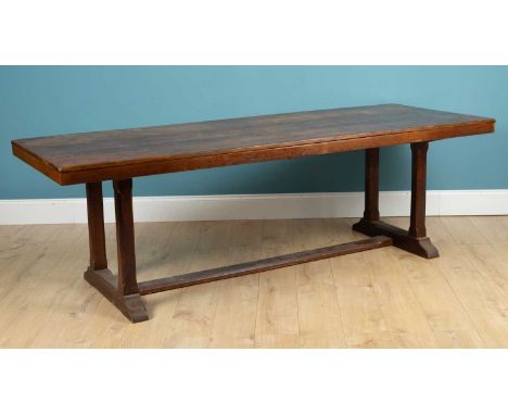 A 20th century oak refectory table77.5cm high x 244cm long x 90.5cm wideScratches to the sides and abrasions to the edges, as