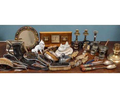 A collection of miscellaneous ornaments and other items to include two silver backed hand mirrors and eight various brushes; 