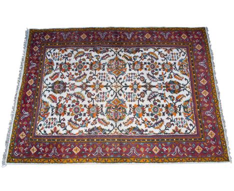 An indo Oushak design cream ground carpetApproximately 407cm x 307cmDirt and wear due to use