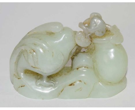 A Chinese jade carving of a bird probably a quail beside a jar8cm longgood condition