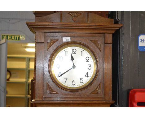 An early 20th Century oak cased grandmother clock with brass movement striking on steel rods, 180cm high