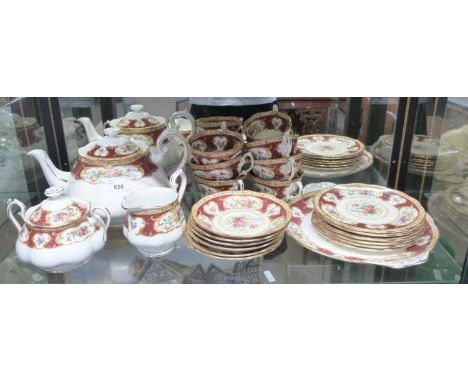 A Royal Albert tea set in the Lady Hamilton pattern comprising teapot, milk jug, sucrier and cover, six cups, saucers and sid