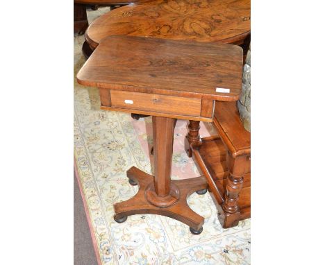 A small early Victorian rosewood pedestal table with tapering column, platform base and turned bun feet, 76cm high