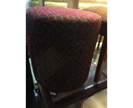 A ROUND POUFFE
