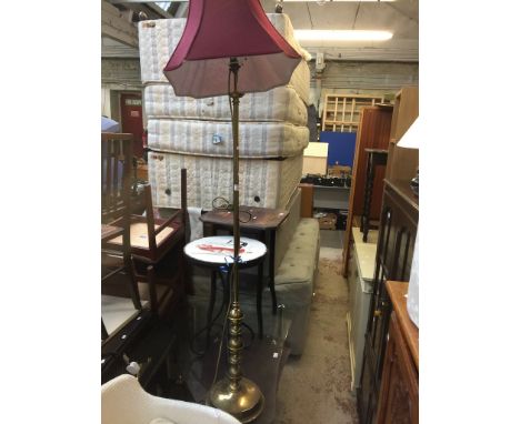 A BRASS STANDARD LAMP