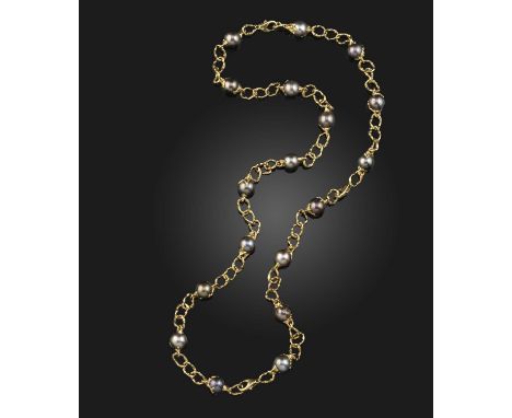 A gold and cultured pearl necklace and pair of bracelets, France, 1970s, composed of textured gold linking, set with cultured