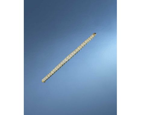 Formerly the property of Elizabeth Taylor, a diamond line bracelet, set with 27 graduated radiant-cut diamonds of yellow tint