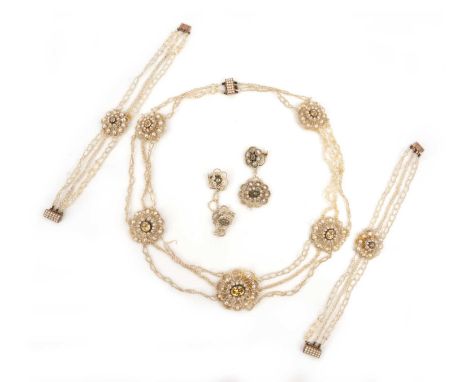 A Regency seed pearl and topaz suite, early 19th century, comprising: a necklace, pair of bracelets and pair of earrings, eac