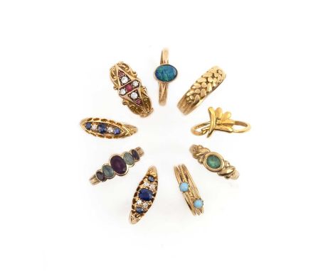 A collection of nine rings, comprising: two sapphire and diamond rings, each mounted in 18ct gold, sizes L1/2 and P, each wit