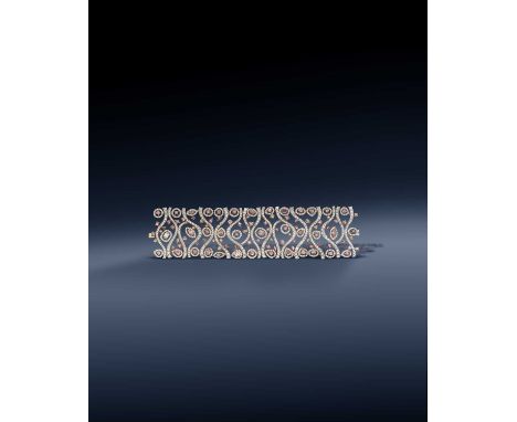 A pink diamond and diamond bracelet, designed as a wide band composed of curved links, set with brilliant-cut diamonds and va