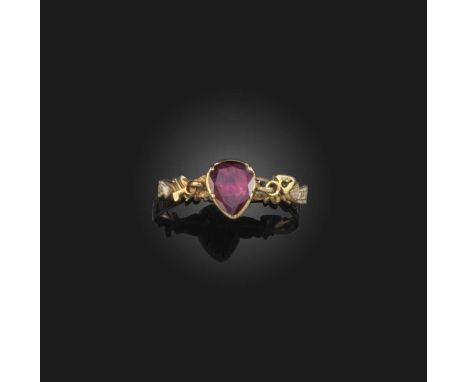 An exquisite enamel and garnet sentimental ring, late 18th century, designed as a heart set with a foil-backed garnet, betwee