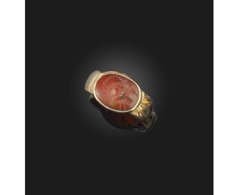 A carnelian intaglio ring, Roman, 2nd century AD and later, set with a carnelian intaglio depicting a gryllus, to a later gol