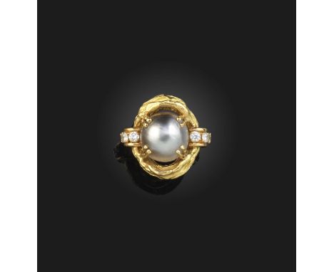 Chaumet, a cultured pearl and diamond ring, set with a central grey cultured half pearl within textured gold surround and dia