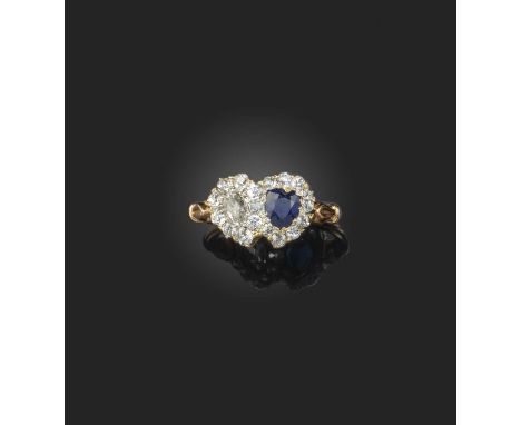 A late 19th century sapphire and diamond ring, set with a heart-shaped sapphire and a pear-shaped diamond, both within a surr