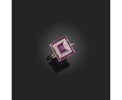 An Art Deco ruby and diamond ring, 1920s, of rectangular outline, set with a step-cut ruby measuring approximately 6.0 x 5.3 
