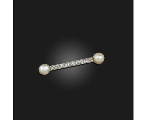 A natural pearl and diamond brooch, France, early 20th century, of bar design, set with a line of cushion-shaped diamonds and
