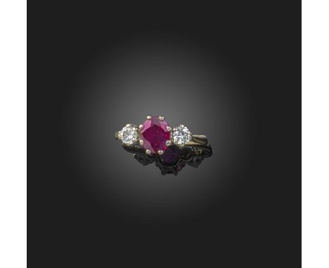 A ruby and diamond ring, claw-set with an oval ruby, between shoulders set with brilliant-cut diamonds, mounted in 18ct gold,
