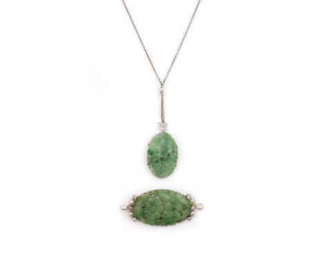 A jadeite brooch and pendant, early 20th century, comprising: a brooch, set with an oval jadeite plaque carved with a design 