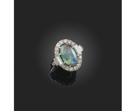 Alabaster &amp; Wilson, a fine Art Deco black opal and diamond ring, 1930s, claw-set with a cabochon black opal measuring 13.