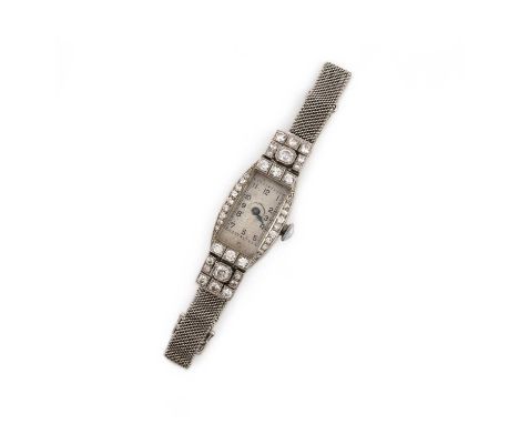 A lady's Art Deco diamond cocktail watch, 1920s, the rectangular silvered dial with black enamel indicators and blue steel ha