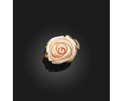 λ A coral and diamond-set gold ring, the carved pink coral rose within diamond-set gold surround, size J