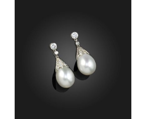 A pair of cultured pearl and diamond earrings, the round brilliant-cut diamond suspending a small diamond, with a diamond cap