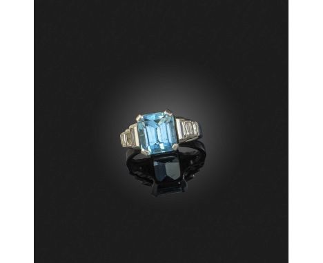 An Art Deco aquamarine and diamond ring, first half 20th century, claw-set with a step-cut aquamarine weighing approximately 