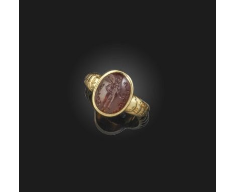 A carnelian intaglio ring, Gandharan, circa 1st century BC - 1st century AD,  set with an oval carnelian intaglio depicting a