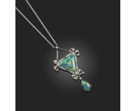 A Belle Epoque black opal and diamond pendant, set with a triangular opal cabochon within diamond border decorated with diamo