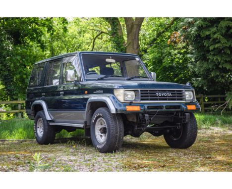 On offer directly from the Callis Collection.
Finished in dark green with grey / blue cloth interior. Useful seven-seat confi
