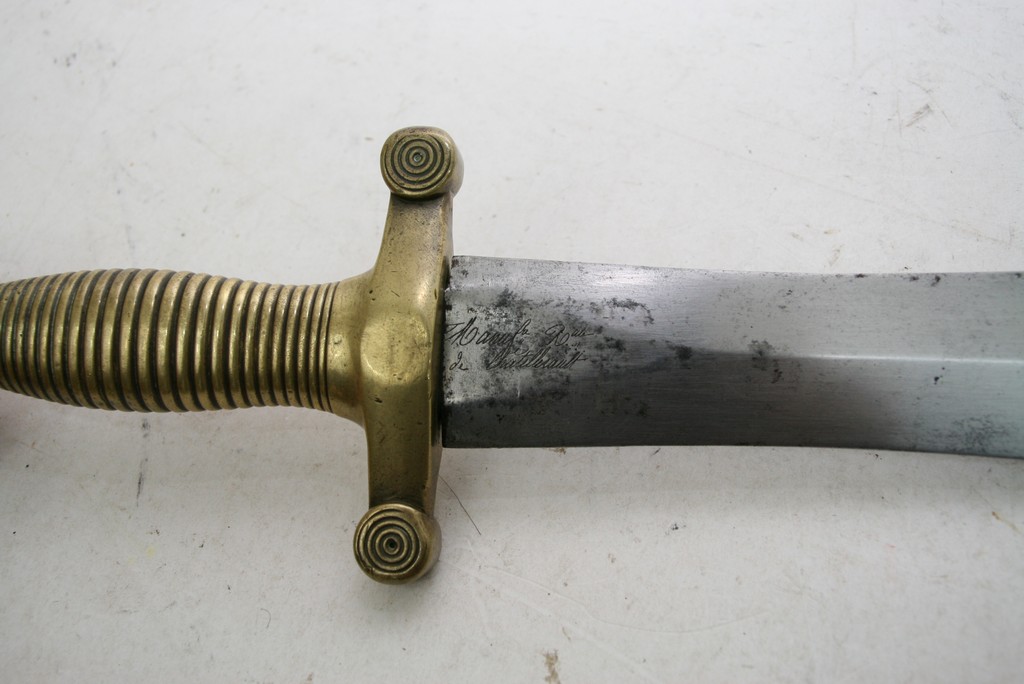An 1832 French artillery short sword with matching serial numbers