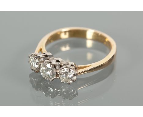 DIAMOND THREE STONE RING
the brilliant cut diamonds totalling approximately 1.20 carats, unmarked, size O-P