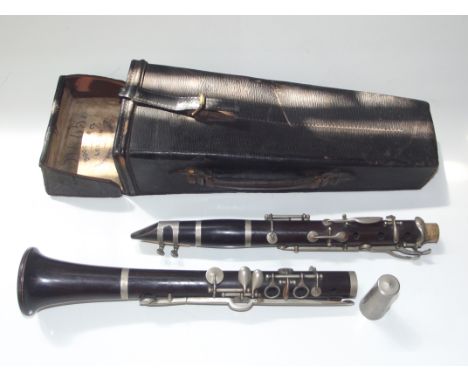 A leather cased Boosey &amp; Co London clarinet 18123