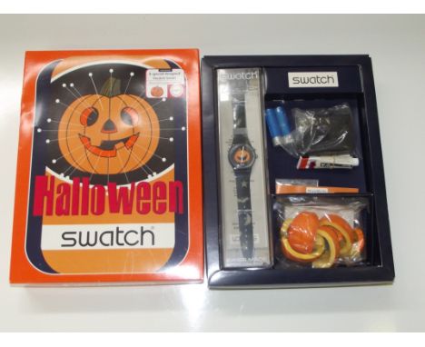 Halloween Swatch watch, a special designed Swatch loomi. With unopened original content