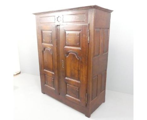 An 18th century joined oak larder cupboard, with two panelled doors, shelf fitted interior and carved decoration. 137x168x62c