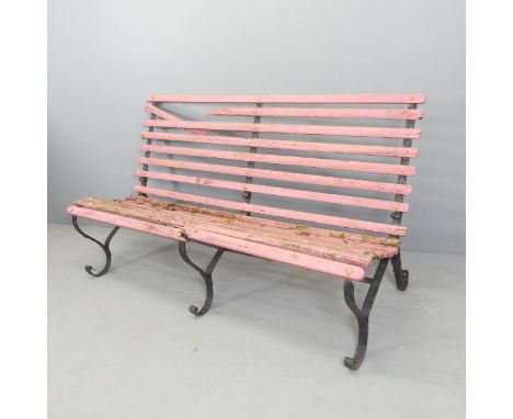 An antique painted teak slatted garden bench on folding wrought iron frame. 153x86x62cm. Slats A/F. 