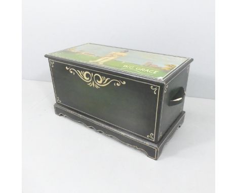 A modern painted pine trunk with cricket themed mural to top. 88x46x44cm. 