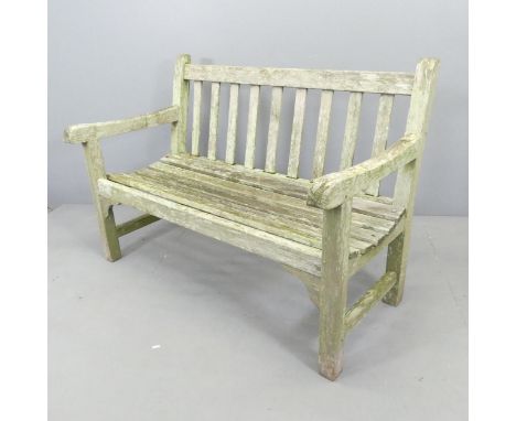 LISTER - A weathered teak slatted garden bench. Overall 121x85x68cm. With maker's label. 