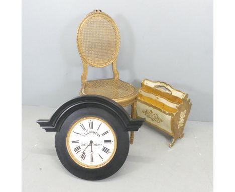 A French cane panelled bedroom chair, a Florentine style magazine rack and a French style quartz clock. (3) 