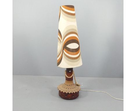 A mid-century West German pottery floor lamp with original shade. Height overall 134cm.Impressed 3255 beneath base. Unable to