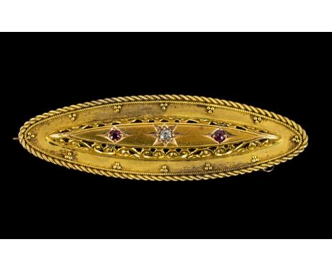 Victorian Period Nice Quality 15ct Gold - Diamond and Ruby Set Ornate Brooch with 9ct Gold Safety Chain, The Central Diamond 
